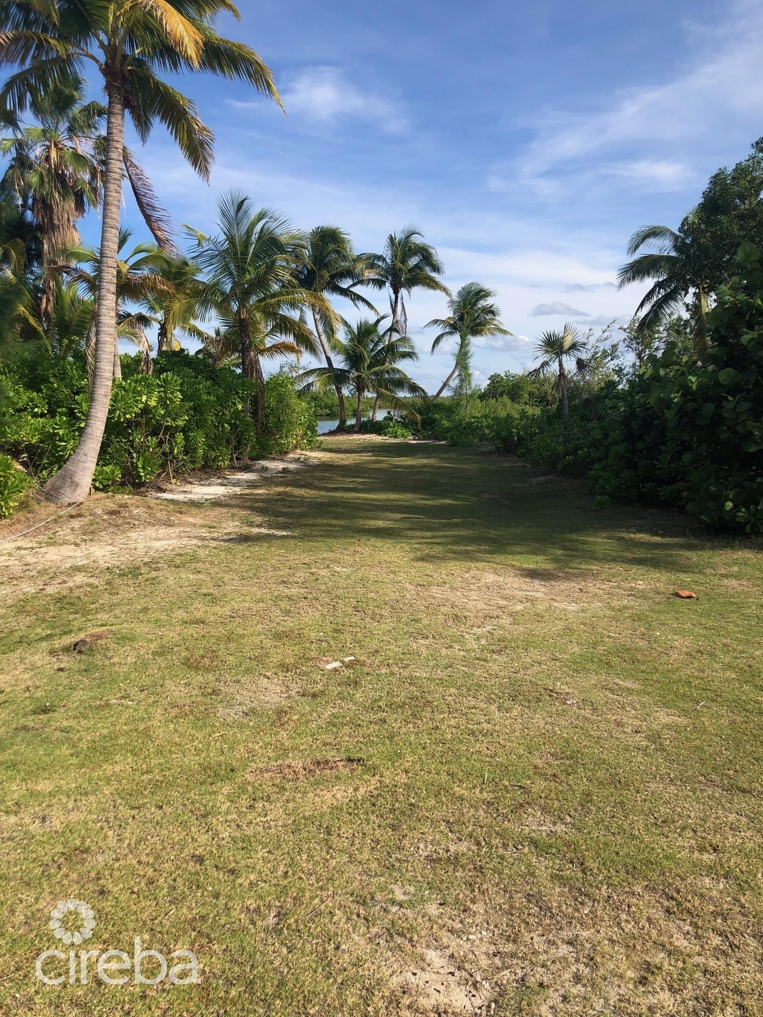 LARGE CAYMAN KAI OCEANFRONT LOT ON LITTLE SOUND WITH WATER CONNECTION