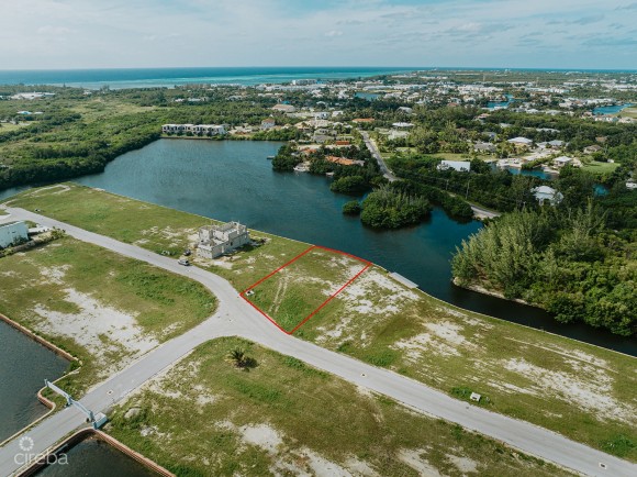 LARGEST LOT IN MUSTIQUE COVE - 0.31 ACRE CANAL LOT