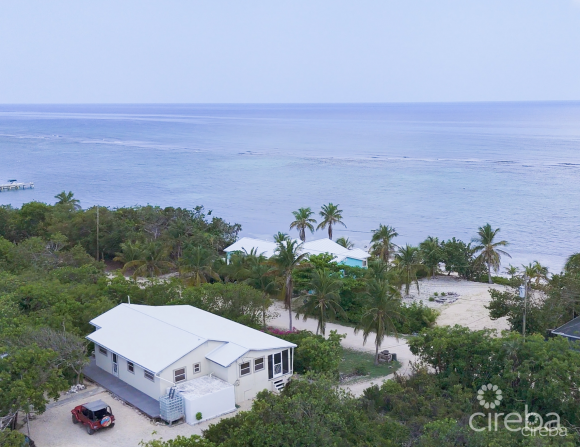 LITTLE CAYMAN OCEAN VIEW RESIDENTIAL HOME W/ BEACHFRONT LOT JUST SHY OF 1 ACRE